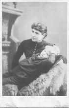 SA1318.12 - Woman and child in a studio setting., Winterthur Shaker Photograph and Post Card Collection 1851 to 1921c